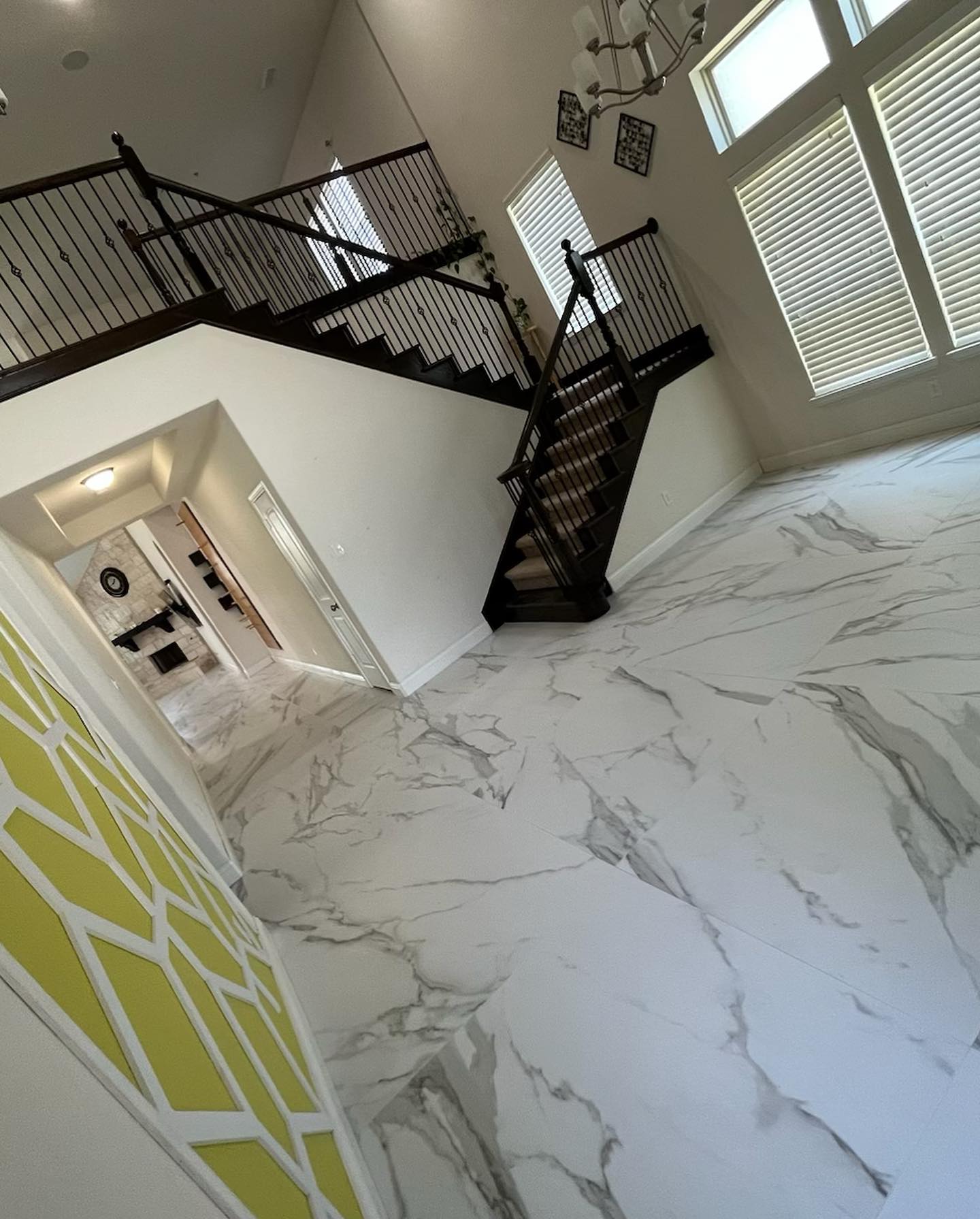 Grand marble tile entryway and staircase installation in Frisco, TX